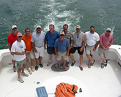 Pictures just don't do the boat justice. If you were wondering how much room that you will have onboard look at these 10 adults that stand along the stern!